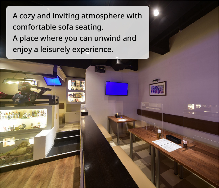 A cozy and inviting atmosphere with comfortable sofa seating. A place where you can unwind and enjoy a leisurely experience.